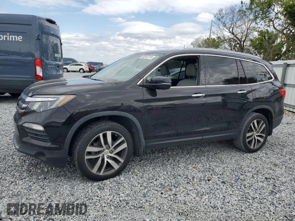 2017 Honda Pilot Touring with VIN 5FNYF6H9XHB075468, listed as a Copart auction lot 50012215 with 90,718 mi miles and Salvage Title. Bid and sale history available at carsss.com. Image 1.