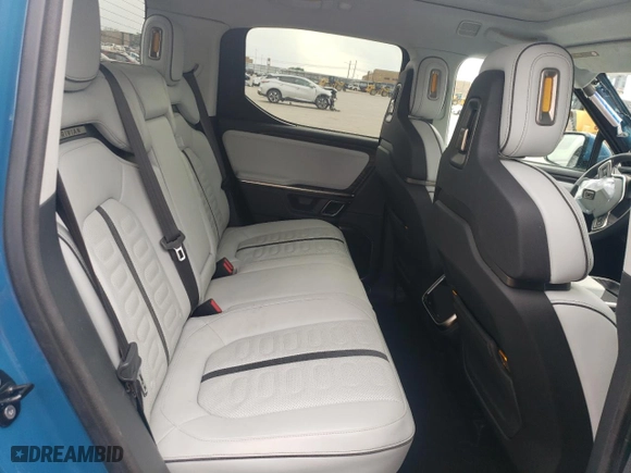 2023 Rivian R1T Adventure with VIN 7FCTGAAA8PN017335, listed as a Copart auction lot 63705604 with 0 mi miles and Clean Title. Bid and sale history available at carsss.com. Image 10.