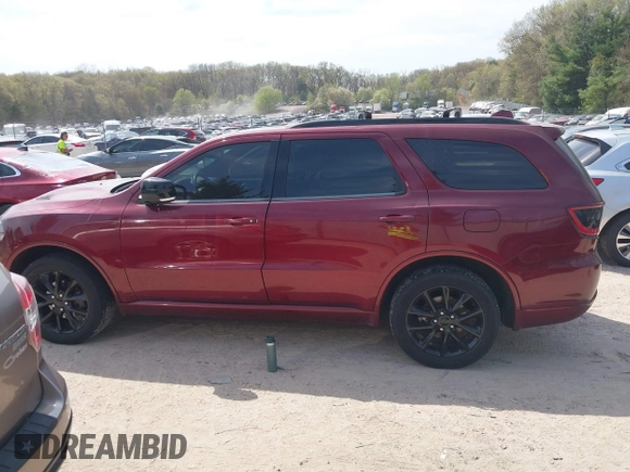 2018 Dodge Durango GT with VIN 1C4RDJDG0JC386749, listed as a IAAI auction lot 42196900 with 92,893 mi miles and . Bid and sale history available at DreamBid. Image 14.