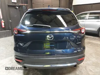 2020 Mazda CX-9 Grand Touring with VIN JM3TCBDY4L0403376, listed as a IAAI auction lot 42357363 with 86,716 mi miles and . Bid and sale history available at DreamBid. Image 16.