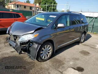 2014 Toyota Sienna Limited with VIN 5TDDK3DC8ES078175, listed as a Copart auction lot 61138585 with 98,527 mi miles and Salvage title. Bid and sale history available at DreamBid. Image 1.