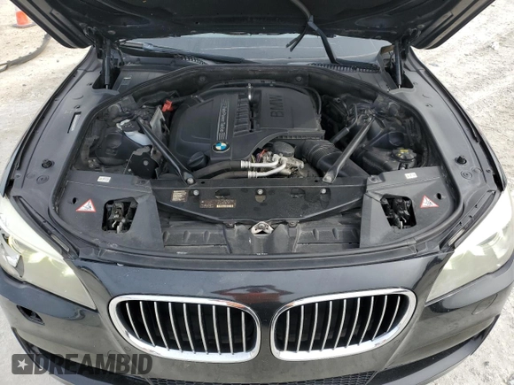 2015 BMW 7 Series 740i with VIN WBAYA6C50FD826727, listed as a Copart auction lot 82197433 with 241,799 mi miles and . Bid and sale history available at DreamBid. Image 11.