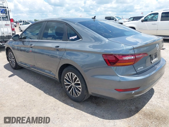 2019 Volkswagen Jetta S z VIN 3VWC57BUXKM061537, wystawiony jako IAAI lot #42170921 z przebiegiem 88 476 mil mil oraz . Historia ofert i sprzedaży dostępna na DreamBid. Obrazek 3.