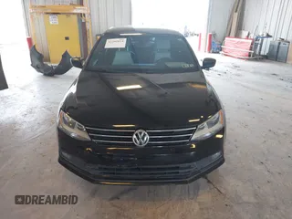 2015 Volkswagen Jetta SE z VIN 3VWD17AJ7FM415950, wystawiony jako IAAI lot #42202024 z przebiegiem 107 877 mil mil oraz . Historia ofert i sprzedaży dostępna na DreamBid. Obrazek 6.