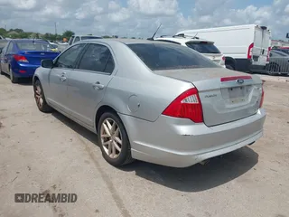 2012 Ford Fusion SEL with VIN 3FAHP0JG7CR302910, listed as a IAAI auction lot 42100004 with 215,761 mi miles. Bid and sale history available at carsss.com. Image 3.