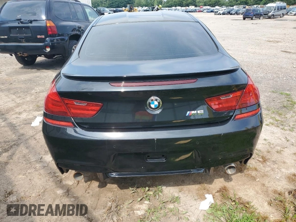 2014 BMW M6 z VIN WBSLX9C54ED160430, wystawiony jako Copart lot #66270794 z przebiegiem 92 025 mil mil oraz Szkoda całkowita • Salvage title. Historia ofert i sprzedaży dostępna na DreamBid. Obrazek 6.