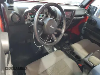 2008 Jeep Wrangler Rubicon with VIN 1J8GA641X8L586923, listed as a Copart auction lot 56243405 with 93,173 mi miles and Salvage title. Bid and sale history available at DreamBid. Image 8.
