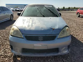 2006 Suzuki Aerio Premium z VIN JS2RA62S665301623, wystawiony jako Copart lot #77708054 z przebiegiem 189 464 mil mil oraz Szkoda całkowita • Salvage title. Historia ofert i sprzedaży dostępna na DreamBid. Obrazek 5.