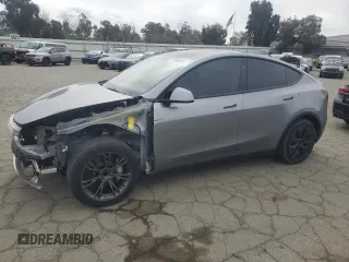 2025 Tesla Model Y Long Range with VIN 7SAYGDED7SF227582, listed as a Copart auction lot 47556595 with 5,340 mi miles and Salvage Title. Bid and sale history available at DreamBid. Image 1.