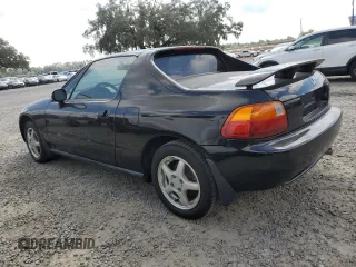 1997 Honda del Sol Si with VIN JHMEH6263VS001799, listed as a Copart auction lot 73735194 with 52,448 mi miles and Salvage Title. Bid and sale history available at carsss.com. Image 2.