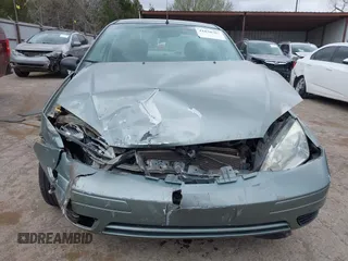 2005 Ford Focus S with VIN 1FAFP34N55W316128, listed as a IAAI auction lot 41830704 with 120,638 mi miles and . Bid and sale history available at carsss.com. Image 12.