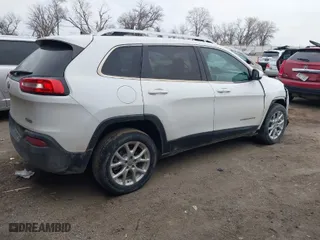 2015 Jeep Cherokee Latitude with VIN 1C4PJLCB5FW737467, listed as a IAAI auction lot 41125508 with 132,463 mi miles. Bid and sale history available at carsss.com. Image 4.