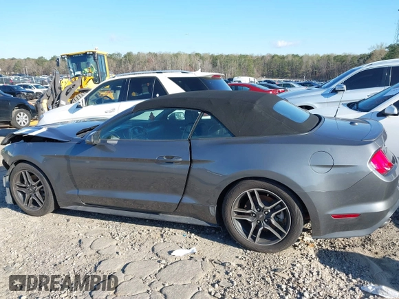 2021 Ford Mustang EcoBoost z VIN 1FATP8UH3M5105279, wystawiony jako IAAI lot #41712821 z przebiegiem 99 760 mil mil oraz . Historia ofert i sprzedaży dostępna na DreamBid. Obrazek 14.