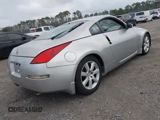 2003 Nissan 350Z Touring z VIN JN1AZ34E13T007885, wystawiony jako IAAI lot #41567717 z przebiegiem 149 279 mil mil oraz . Historia ofert i sprzedaży dostępna na DreamBid. Obrazek 4.