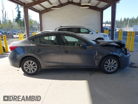 2014 Mazda 3 i Grand Touring with VIN JM1BM1W76E1174860, listed as a IAAI auction lot 42095053 with 44,727 mi miles and . Bid and sale history available at DreamBid. Image 14.