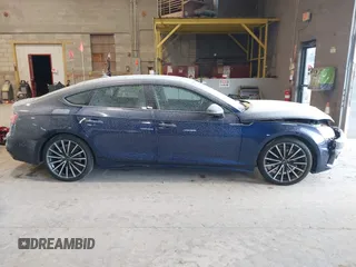 2022 Audi A5 Sportback Premium Plus z VIN WAUCBCF57NA005917, wystawiony jako IAAI lot #41362046 z przebiegiem 28 224 mil mil oraz . Historia ofert i sprzedaży dostępna na DreamBid. Obrazek 13.