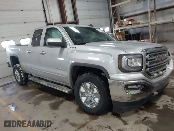 2018 GMC Sierra 1500 SLE z VIN 1GTV2MEH8JZ357073, wystawiony jako IAAI lot #41642234 z przebiegiem 105 007 mil mil oraz . Historia ofert i sprzedaży dostępna na DreamBid. Obrazek 1.