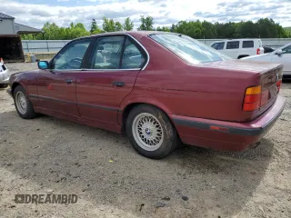 1995 BMW 5 Series 525i z VIN WBAHD632XSGK86387, wystawiony jako Copart lot #58245795 z przebiegiem 168 925 mil mil oraz Czysty tytuł • Clean title. Historia ofert i sprzedaży dostępna na DreamBid. Obrazek 2.