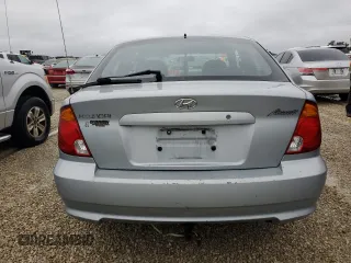 2005 Hyundai Accent GLS with VIN KMHCG35C75U354574, listed as a Copart auction lot 74931444 with 141,013 mi miles and Salvage Title. Bid and sale history available at carsss.com. Image 6.