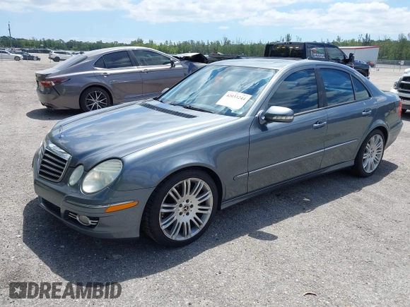 2008 Mercedes-Benz E-Class Luxury 3.5L with VIN WDBUF56X28B350102, listed as a IAAI auction lot 42033244 with 257,767 mi miles. Bid and sale history available at carsss.com. Image 2.