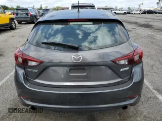 2018 Mazda 3 Touring z VIN 3MZBN1L38JM219466, wystawiony jako Copart lot #56766025 z przebiegiem 124 775 mil mil oraz Szkoda całkowita • Salvage title. Historia ofert i sprzedaży dostępna na DreamBid. Obrazek 6.
