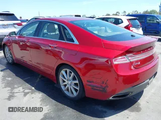 2016 Lincoln MKZ z VIN 3LN6L2G93GR612748, wystawiony jako IAAI lot #42262334 z przebiegiem 72 190 mil mil oraz . Historia ofert i sprzedaży dostępna na DreamBid. Obrazek 3.