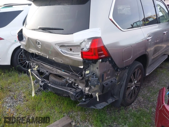 2021 Lexus LX 570 z VIN JTJDY7AX9M4335171, wystawiony jako IAAI lot #41754348 z przebiegiem 32 119 mil mil oraz . Historia ofert i sprzedaży dostępna na DreamBid. Obrazek 16.