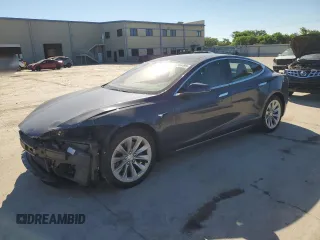 2017 Tesla Model S 60 z VIN 5YJSA1E14HF184188, wystawiony jako Copart lot #55836495 z przebiegiem 94 623 mil mil oraz Szkoda całkowita • Salvage title. Historia ofert i sprzedaży dostępna na DreamBid. Obrazek 1.