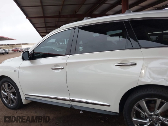 2015 Infiniti QX60 with VIN 5N1AL0MM6FC553098, listed as a IAAI auction lot 42024025 with 70,080 mi miles and . Bid and sale history available at DreamBid. Image 14.