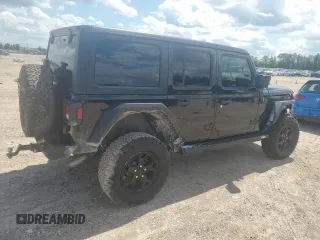 2021 Jeep Wrangler Unlimited Willys with VIN 1C4HJXDN0MW859686, listed as a Copart auction lot 56657725 with 49,984 mi miles and Salvage title. Bid and sale history available at DreamBid. Image 3.