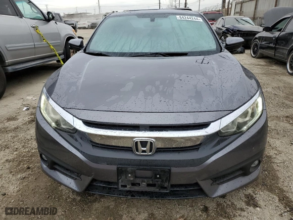 2016 Honda Civic Coupe EX-T with VIN 2HGFC3B32GH351493, listed as a Copart auction lot 84244244 with 124,497 mi miles and Salvage Title. Bid and sale history available at carsss.com. Image 5.