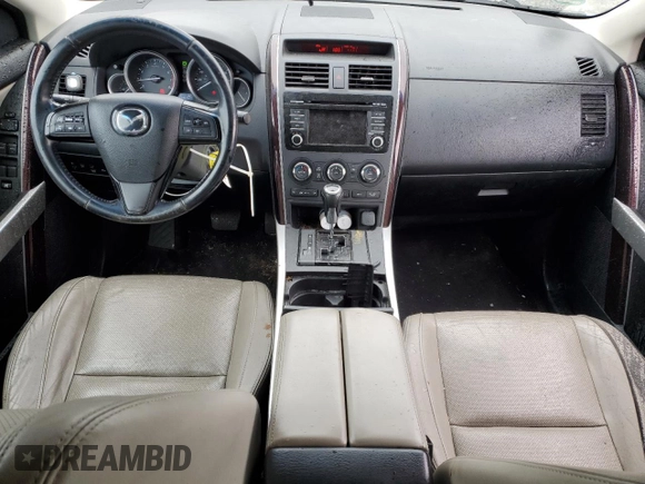 2014 Mazda CX-9 Grand Touring with VIN JM3TB2DA5E0438288, listed as a Copart auction lot 56970705 with 147,526 mi miles and Salvage title. Bid and sale history available at DreamBid. Image 8.