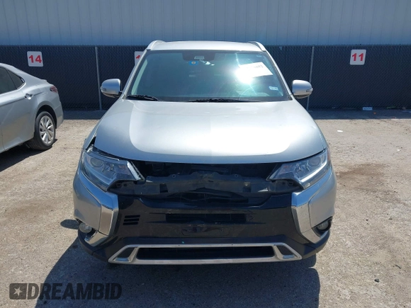 2020 Mitsubishi Outlander SE z VIN JA4AD3A30LZ029043, wystawiony jako IAAI lot #41976692 z przebiegiem 98 536 mil mil oraz . Historia ofert i sprzedaży dostępna na DreamBid. Obrazek 12.