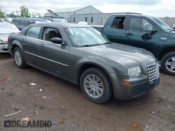 2009 Chrysler 300 LX with VIN 2C3KA43D49H558006, listed as a IAAI auction lot 42178195 with 208,864 mi miles and . Bid and sale history available at DreamBid. Image 1.