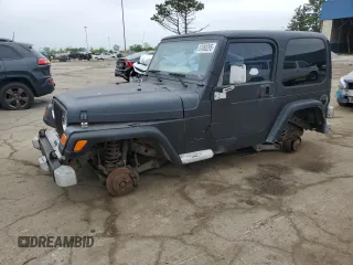2002 Jeep Wrangler Sport z VIN 1J4FA49S22P763189, wystawiony jako Copart lot #57650295 z przebiegiem 197 383 mil mil oraz Czysty tytuł • Clean title. Historia ofert i sprzedaży dostępna na DreamBid. Obrazek 1.