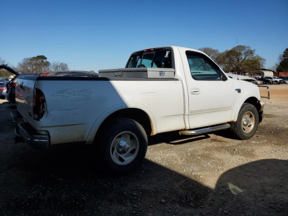 2000 Ford F-150 XL with VIN 1FTRF18W0YNB59622, listed as a Copart auction lot 50178485 with 264,057 mi miles and Salvage title. Bid and sale history available at DreamBid. Image 3.