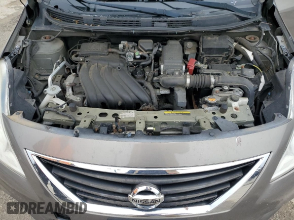 2012 Nissan Versa SV z VIN 3N1CN7AP1CL927523, wystawiony jako Copart lot #58196055 z przebiegiem 156 057 mil mil oraz Nie do naprawy • Non repairable. Historia ofert i sprzedaży dostępna na DreamBid. Obrazek 11.