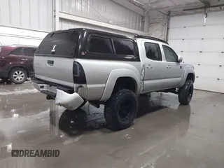2011 Toyota Tacoma with VIN 3TMLU4EN9BM070836, listed as a IAAI auction lot 41668595 with 89,879 mi miles and . Bid and sale history available at DreamBid. Image 4.