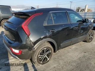 2023 Kia Niro EX with VIN KNDCR3LE9P5076681, listed as a Copart auction lot 42522465 with 56,896 mi miles and Salvage Title. Bid and sale history available at carsss.com. Image 3.