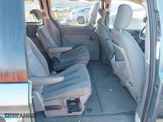 2005 Dodge Caravan SXT with VIN 2D4GP44L55R477013, listed as a IAAI auction lot 41670454 with 166,351 mi miles. Bid and sale history available at carsss.com. Image 8.