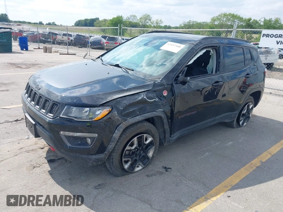 2017 Jeep Compass Trailhawk z VIN 3C4NJDDB6HT631047, wystawiony jako IAAI lot #42457508 z przebiegiem 59 414 mil mil oraz . Historia ofert i sprzedaży dostępna na DreamBid. Obrazek 2.