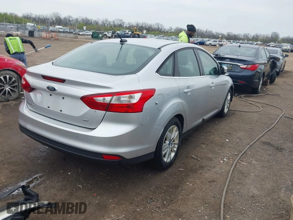 2012 Ford Focus SEL with VIN 1FAHP3H28CL266719, listed as a IAAI auction lot 42008714 with 169,880 mi miles. Bid and sale history available at carsss.com. Image 4.