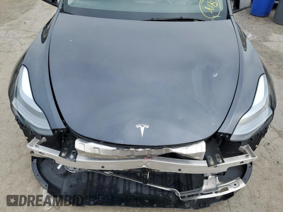 2024 Tesla Model Y Long Range с VIN 7SAYGDEE3RA328991, выставлен на аукционе Copart как лот 56637455 с пробегом Не указан миль и Списание • Salvage title. История ставок и продаж доступна на DreamBid. Изображение 12.