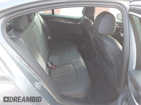 2023 BMW 5 Series 530i xDrive with VIN WBA13BJ04PCL98504, listed as a IAAI auction lot 41702411 with 27,830 mi miles and . Bid and sale history available at DreamBid. Image 8.
