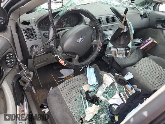 2007 Ford Focus S с VIN 1FAFP34NX7W317259, выставлен на аукционе Copart как лот 52158405 с пробегом 206 602 миль миль и Списание • Salvage title. История ставок и продаж доступна на DreamBid. Изображение 8.