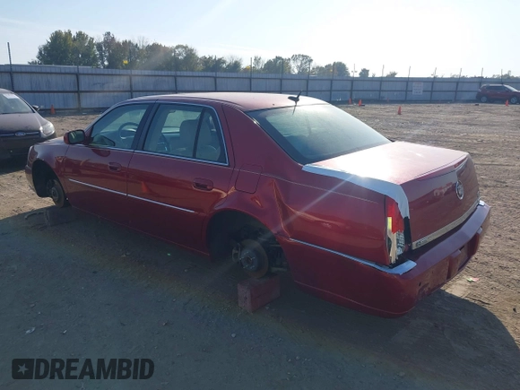 2008 Cadillac DTS 1SC with VIN 1G6KD57Y08U143396, listed as a IAAI auction lot 40618555 with 124,706 mi miles and . Bid and sale history available at carsss.com. Image 3.