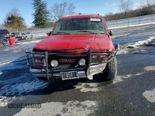1997 GMC Suburban z VIN 3GKGK26J9VG515459, wystawiony jako Copart lot #87515385 z przebiegiem 205 982 mil mil oraz Szkoda całkowita • Salvage title. Historia ofert i sprzedaży dostępna na DreamBid. Obrazek 11.