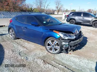 2017 Hyundai Veloster with VIN KMHTC6AD6HU320707, listed as a IAAI auction lot 40857014 with 93,412 mi miles. Bid and sale history available at carsss.com. Image 1.
