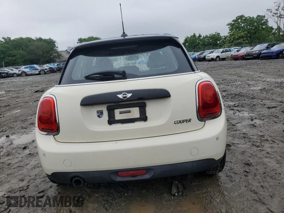 2017 MINI Hardtop 4 Door Cooper with VIN WMWXU1C53H2E18584, listed as a Copart auction lot 61355915 with 56,171 mi miles and Salvage title. Bid and sale history available at DreamBid. Image 6.