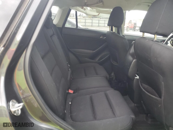 2016 Mazda CX-5 Touring with VIN JM3KE4CY1G0661542, listed as a Copart auction lot 49789775 with 94,005 mi miles and Salvage Title. Bid and sale history available at carsss.com. Image 11.